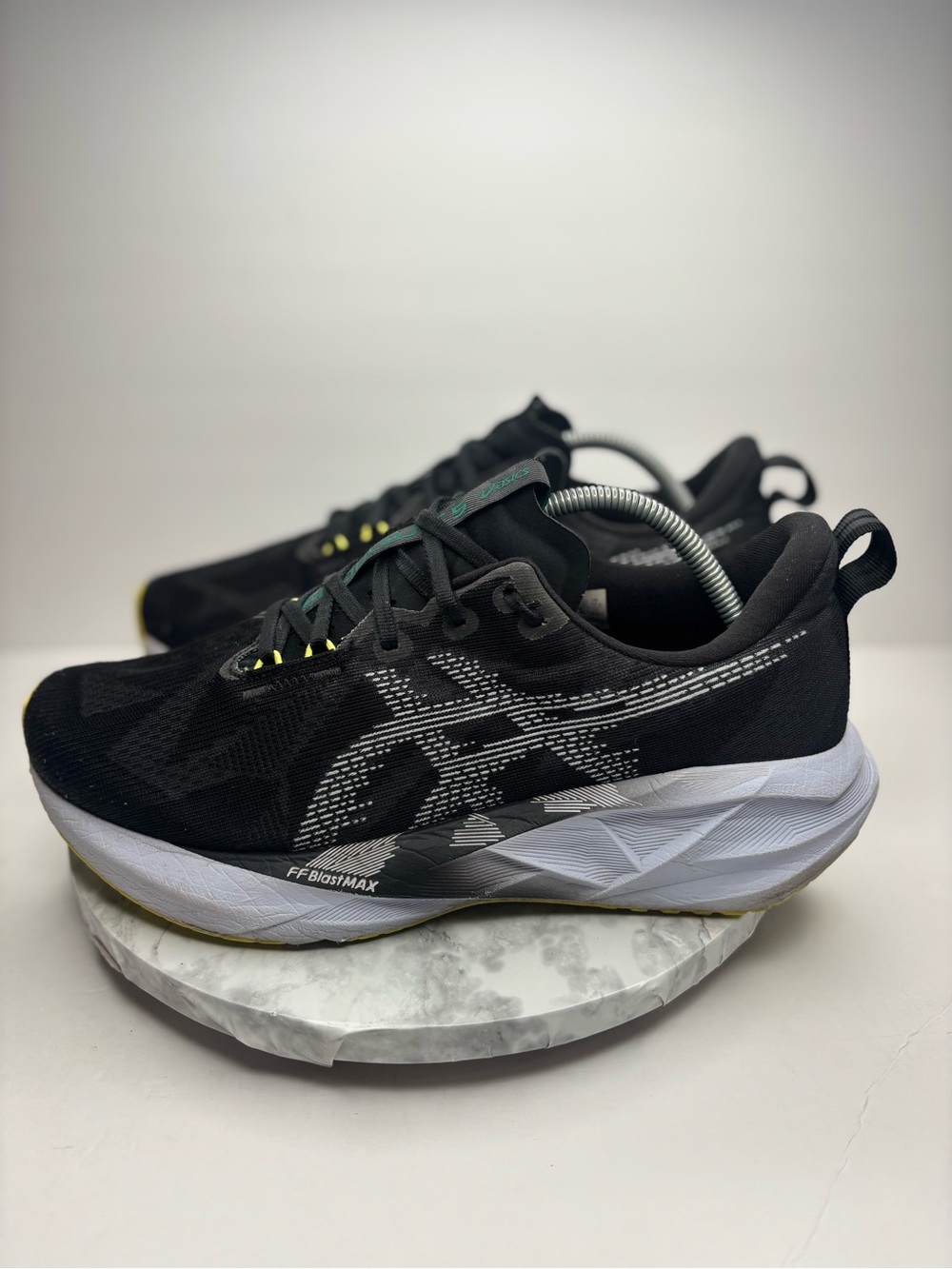 Size 10.5-ASICS Novablast 5 in the Black/Blue Fade